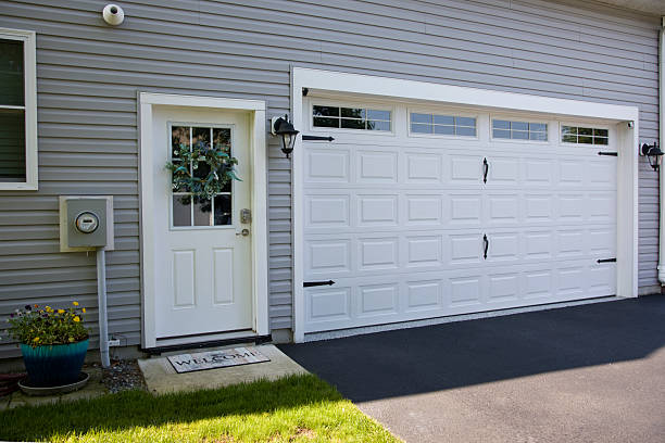 24/7 Emergency Garage Door Panel Replacement experts in Clay Center, KS